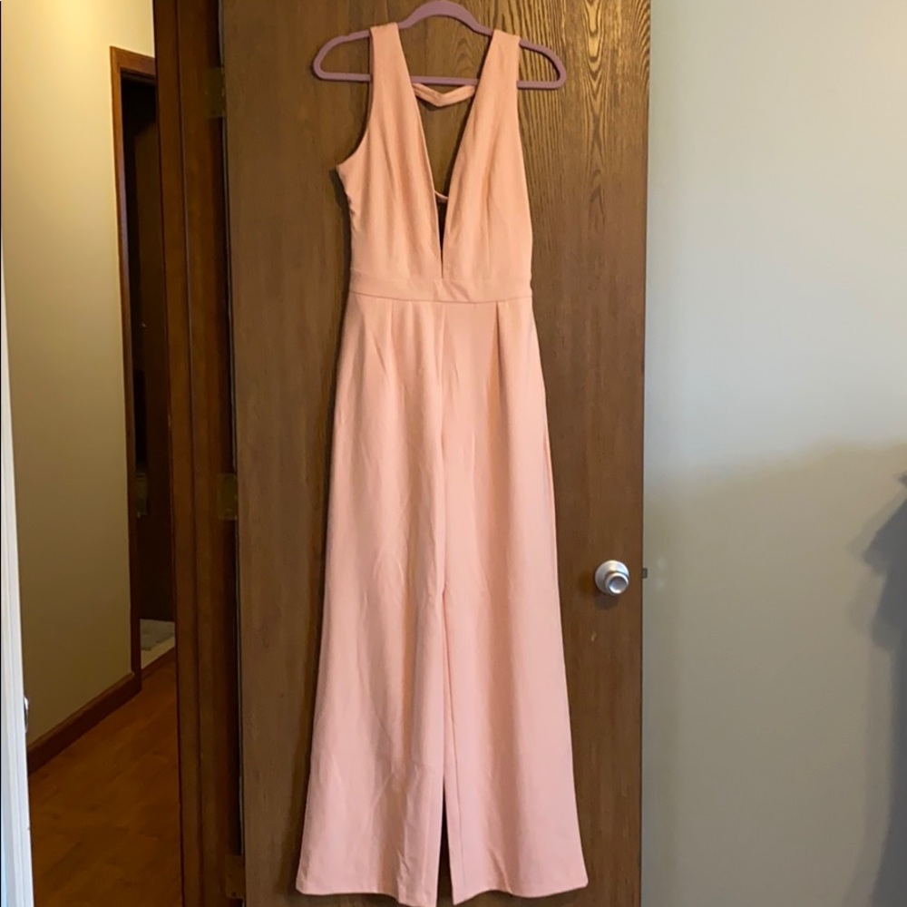 Pink deep plunge neck romper